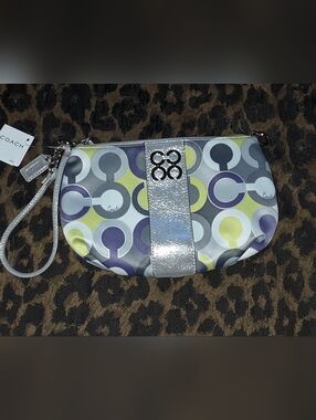 Coach Metallic Silver Wristlet with Multicolor Circle Print